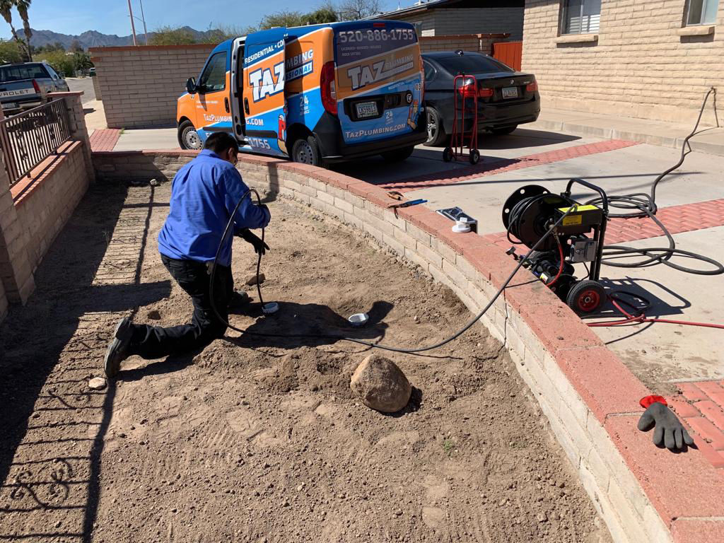 Hydro jetter hose fed through a cleanout access point